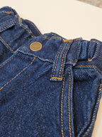 Close-up of expandable waistband on Grow-Ease™ kids jeans for flexible fit as a child grows
